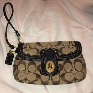 Coach wallet zipper wristlet. Color: Brown, Tan